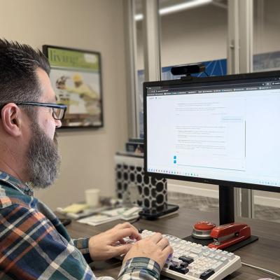 Staff member working at computer