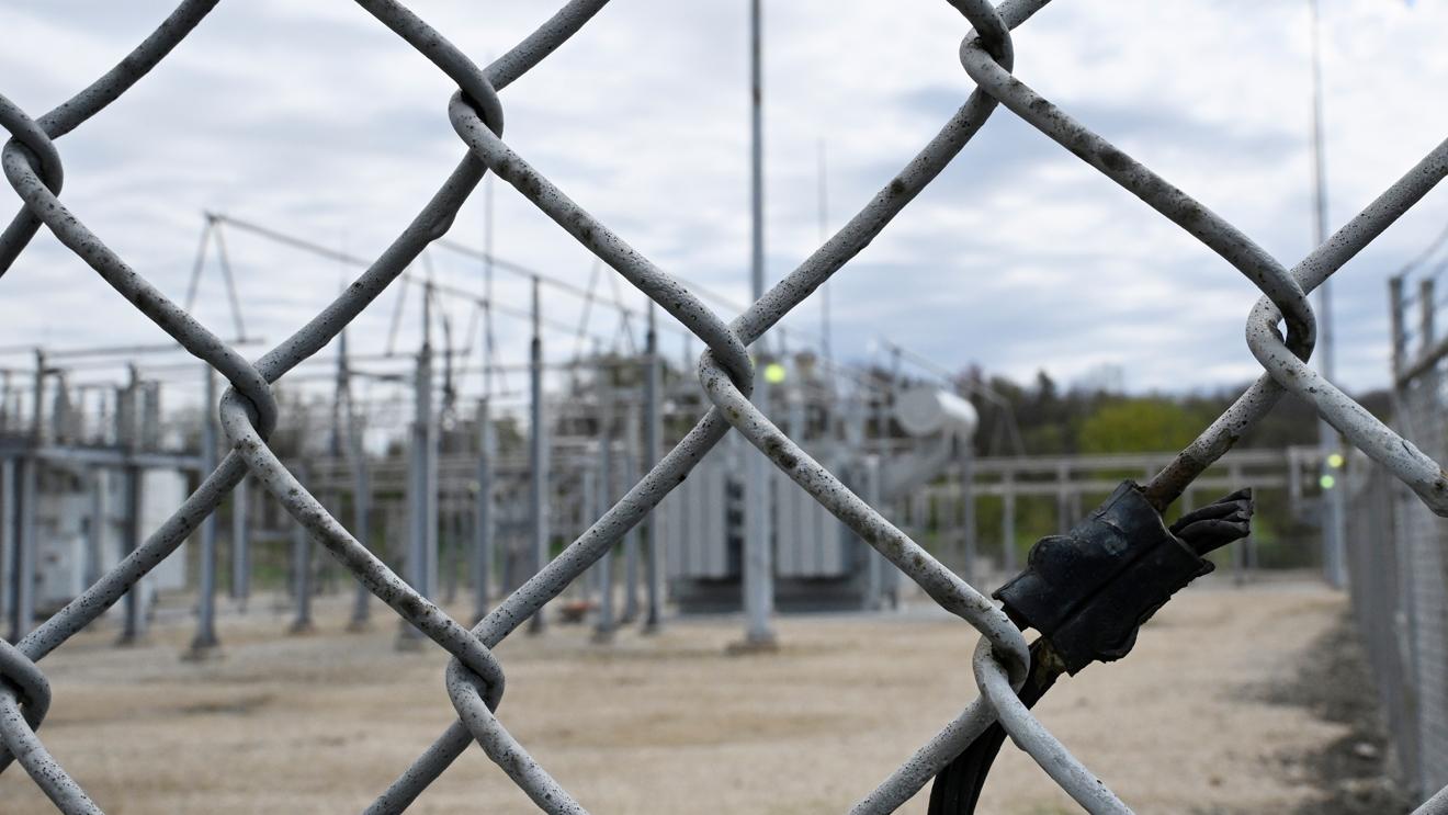 Substation image behind fence