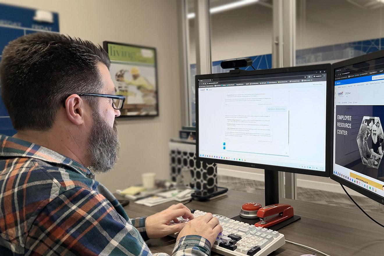 staff member working at computer