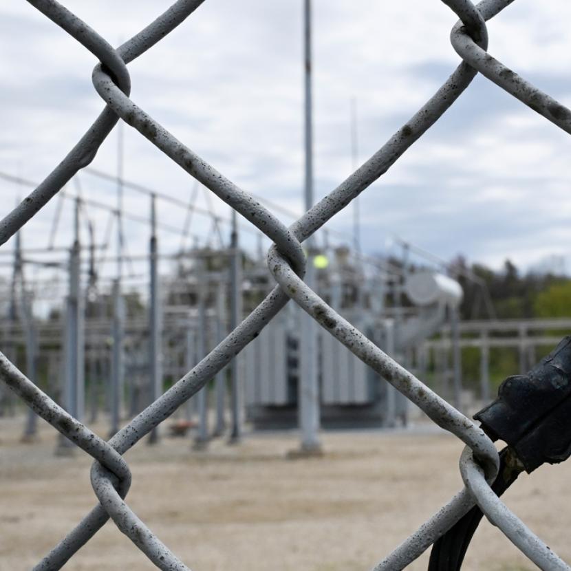 Substation image behind fence